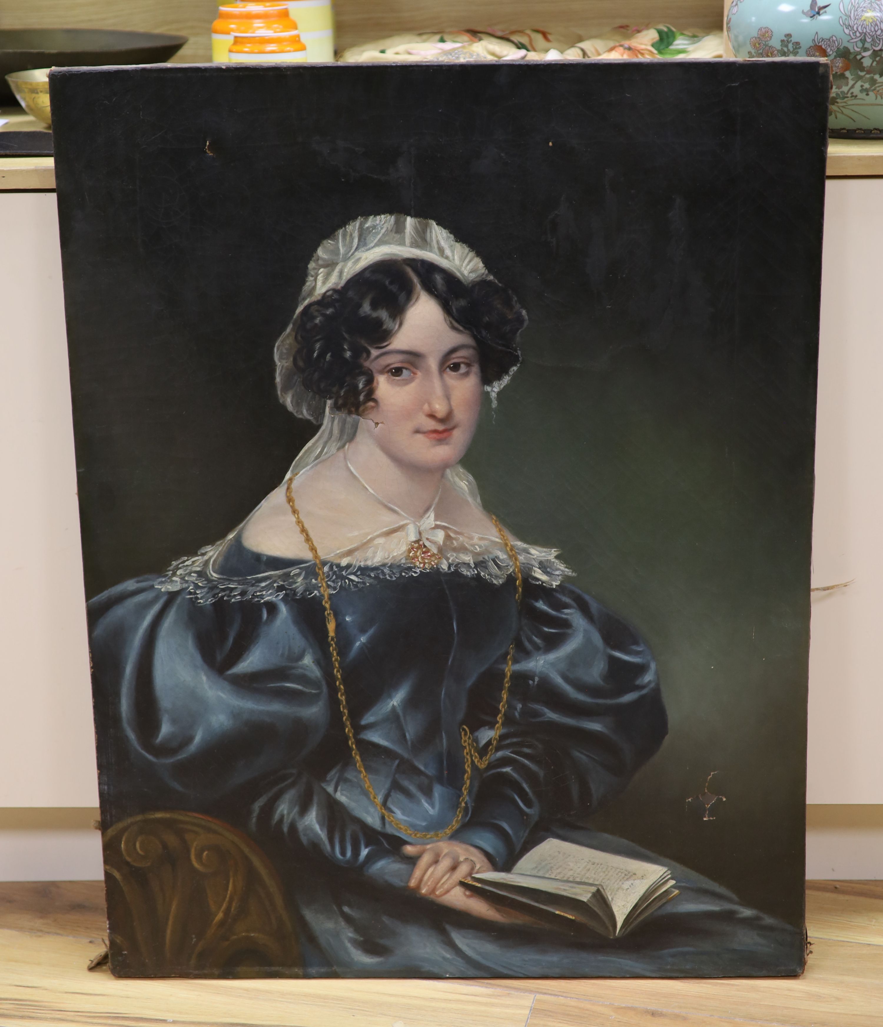 Charles Dukes (1803-1865) Portrait of a lady, seated and reading a book, plaque, signature and Agnew & Zanetti labels verso, oil on canvas, 92 x 71cm (A/F)